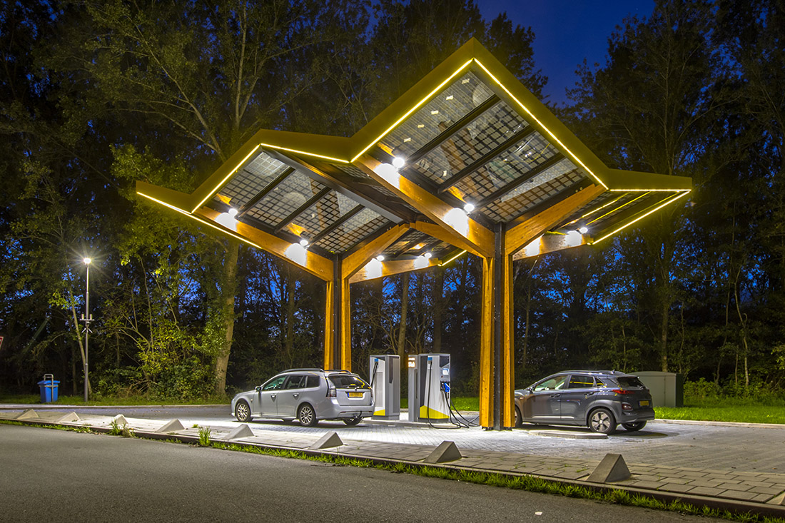 Electric cars charging at electricity filling station