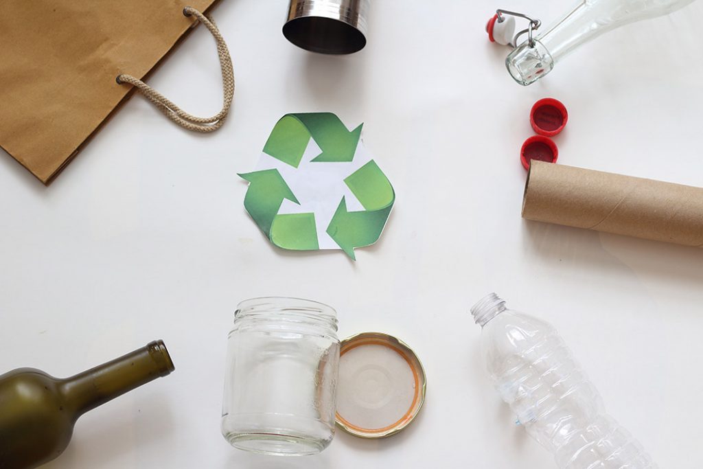 recycling symbol with recyclables